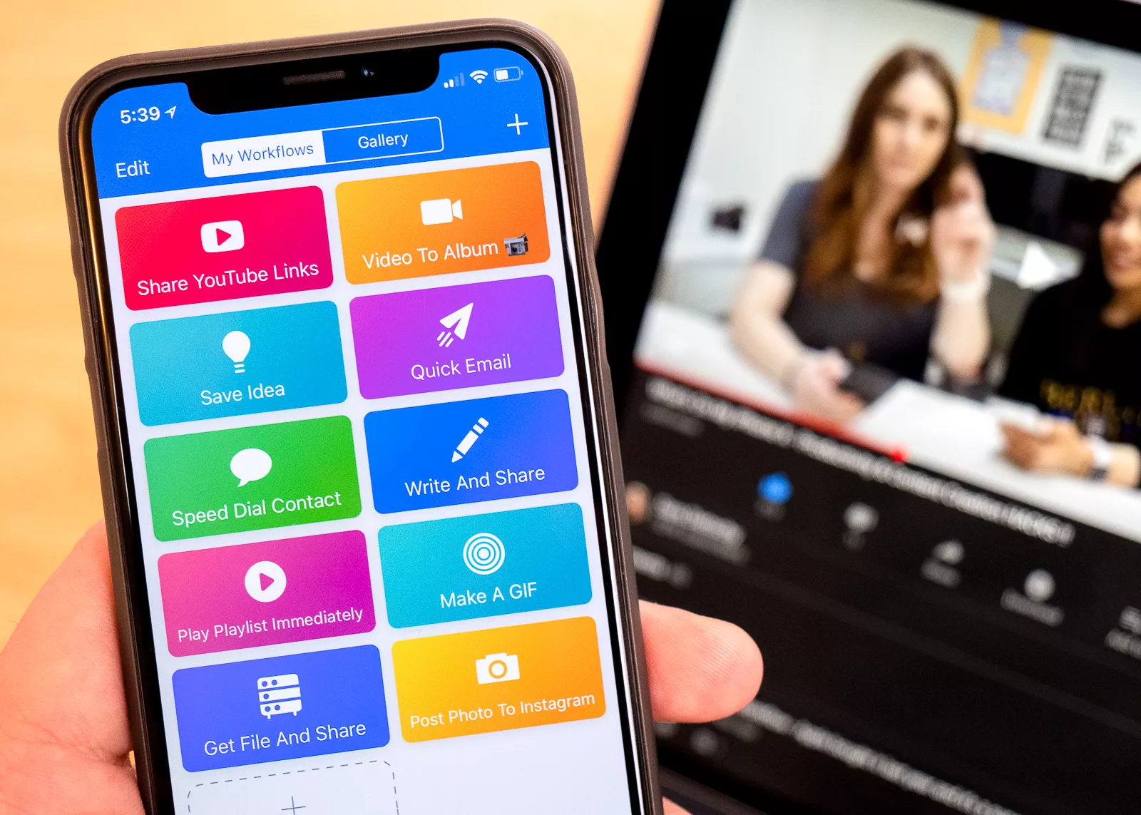 Workflow for iOS showing Sara Dietschy playing on YouTube in background.